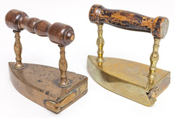 Two Wrought Brass Flat Irons