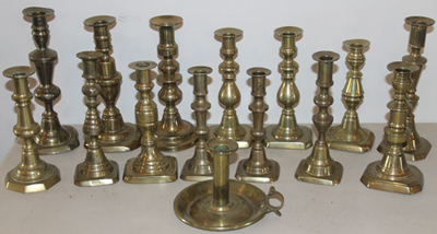 Many Early Brass Candlesticks