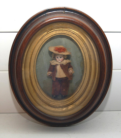 BISQUE DOLL IN FRAME