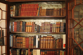SEVERAL EARLY LEATHER BOUND BOOKS