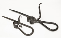 Two Wrought Iron Picket Candlesticks