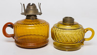 Two Amber Glass Finger Lamps