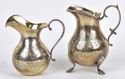 Two Continental Silver Creamers