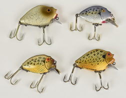 Four Heddon Punkin Seed Fishing Lures
