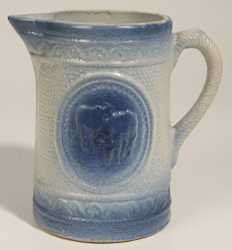 Blue and White Stoneware Cow Pitcher