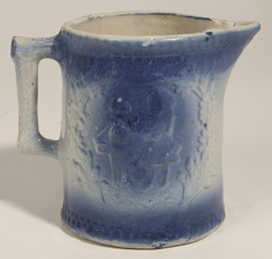 Blue and White Stoneware Pitcher With Children